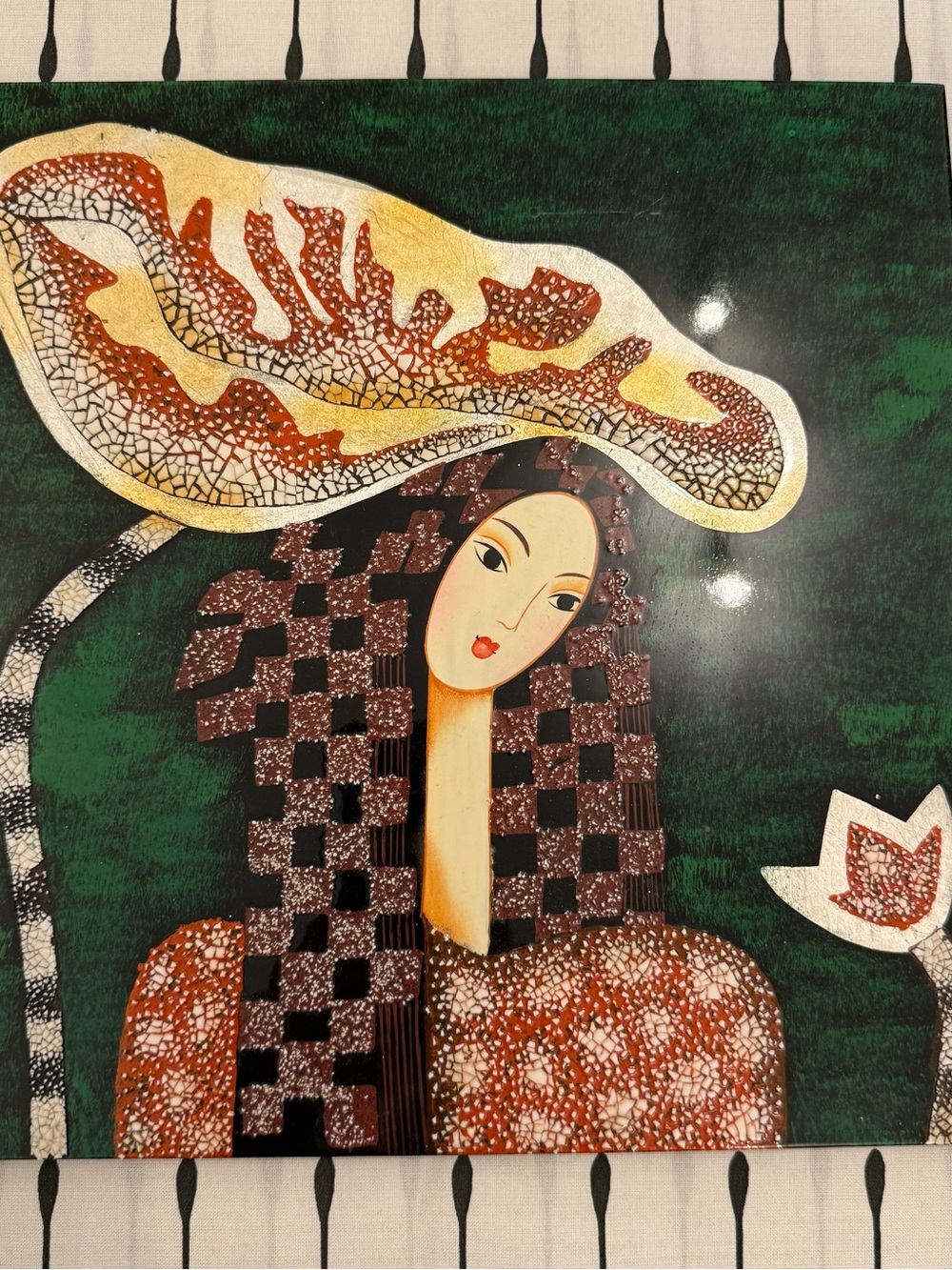 Traditional Vietnamese Lacquer Painting features distinctive eggshell inlays.